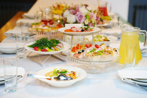 istock A served festive table with a variety of snacks and drinks. 2177187782