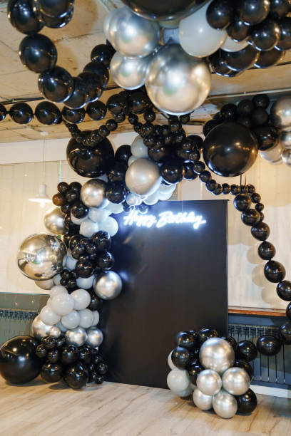 istock Festive birthday decor with silver and black balloons 2177187899