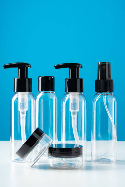 istock Plastic bottles with black caps are neatly arranged on blue background 2177188181