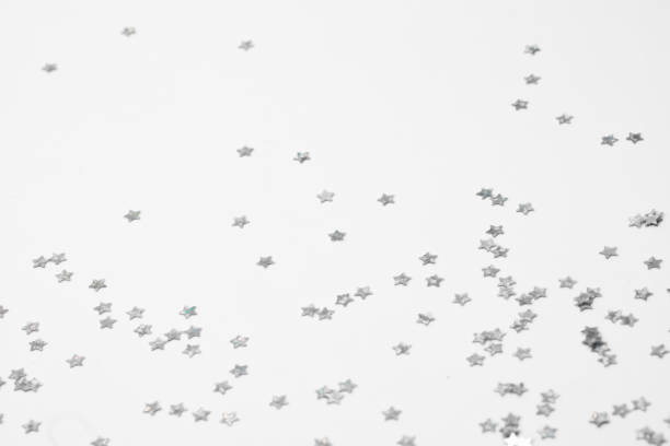 istock sparkles silver stars on white background with text place- Image 2177188209