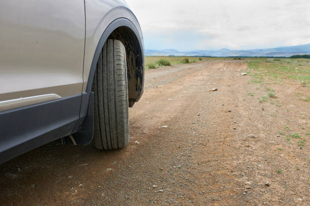 Car on the dirt road in the middle of the steppe. Car on the dirt road in the middle of the steppe. Haval H9 SUV stock pictures, royalty-free photos & images