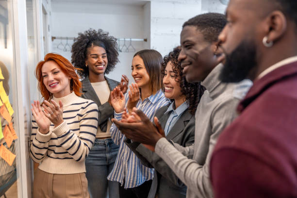 istock Teamwork applauding at the end of a brainstorming meeting 2177190768