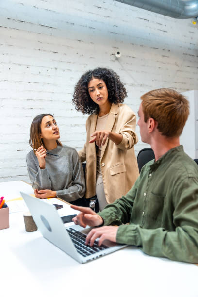 istock Boss scolding two employees in a coworking space 2177190818