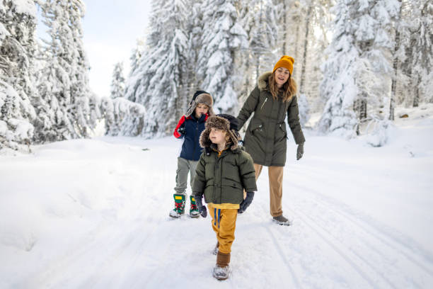 istock Mother and sons enjoying a winter day 2177191740