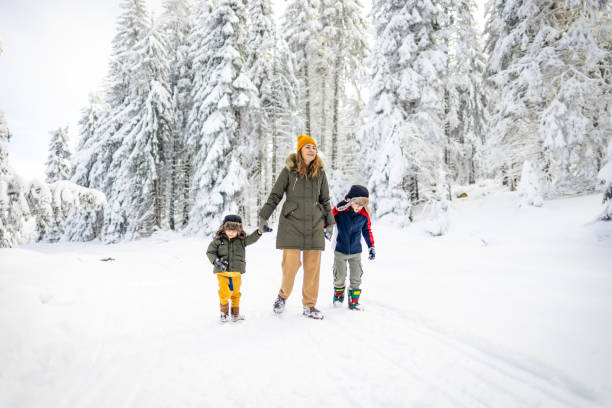 istock Mother and sons enjoying a winter day 2177192066