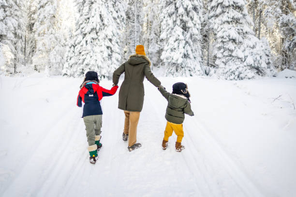 istock Mother and sons enjoying a winter day 2177192107
