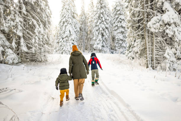 istock Mother and sons enjoying a winter day 2177192497