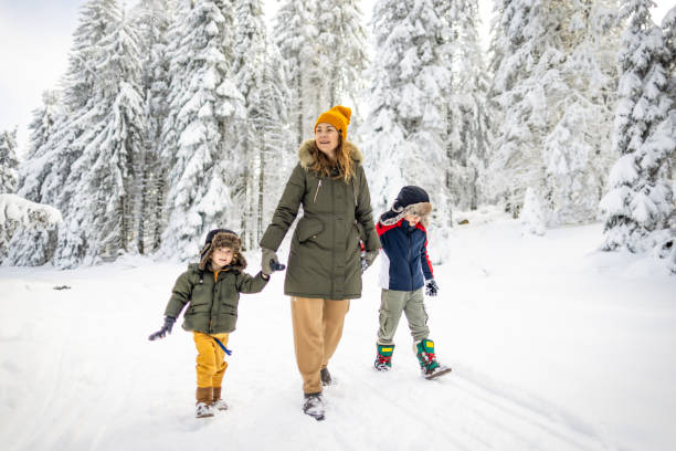 istock Mother and sons enjoying a winter day 2177192684