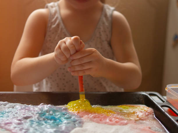 istock a child makes experiments with chemicals. experiments with soda and citric acid 2177194025