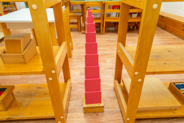 Pink Montessori tower in a classroom setup for learning