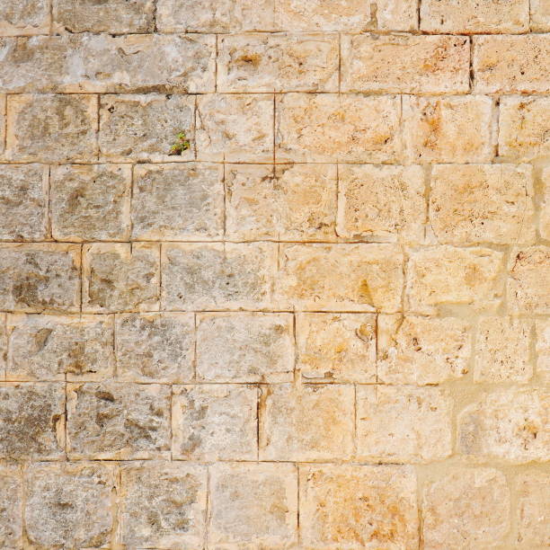 istock Photo Stone Wall Textured Close Up Beige Color 2177194773