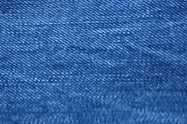 macro blue denim texture, blue denim texture as background close up photo from above