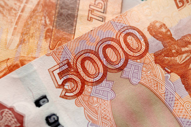 Russian banknotes. Money scattered on the surface