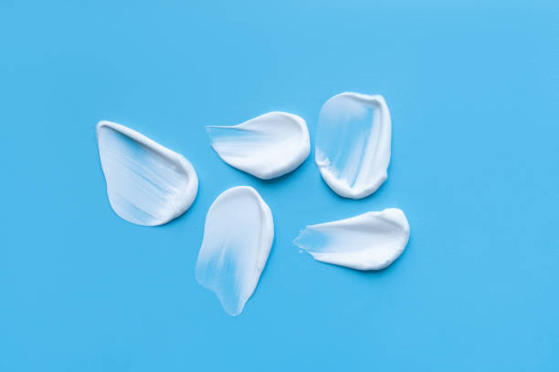 istock A smear of cream on a light background. Beauty concept. 2177199539