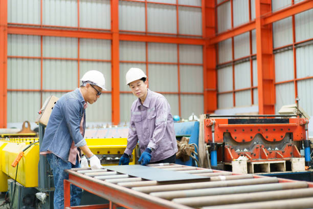 istock Industrial engineer team works together in factory. 2177203830