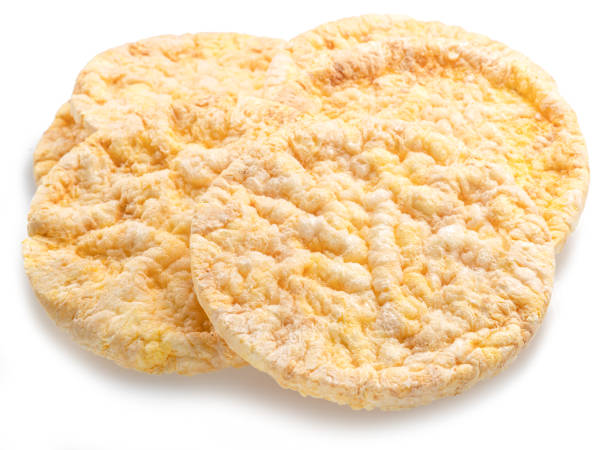 istock Puffed corn cakes or rice cakes isolated on white. Alternative snack for bread product 2177205949