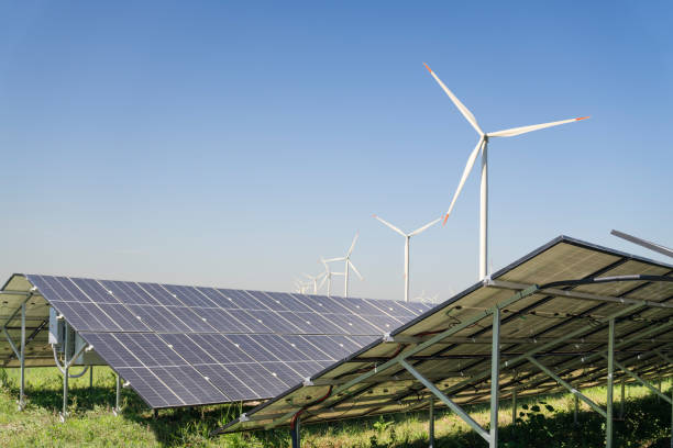 istock Solar panels and wind turbines on a field. Sustainable energy. 2177207833
