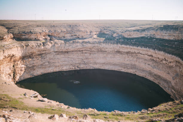 istock Sinkhole in Turkey, showcasing a massive natural depression formed by the collapse of underground caverns 2177211188