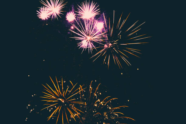 istock Fireworks Display Blue Explosive Colors Gold Pink Elegant Minimal Black Background Party New Years Eve Celebration 2177212546