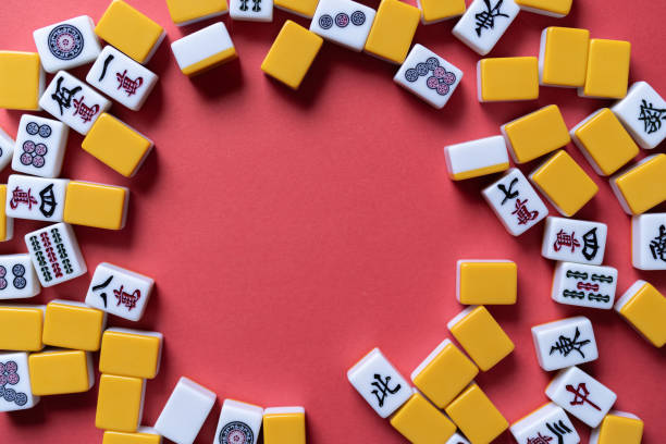 istock Mahjong tiles background on red background 2177218114