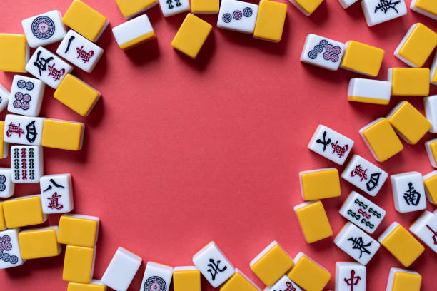 istock Mahjong tiles background on red background 2177218133