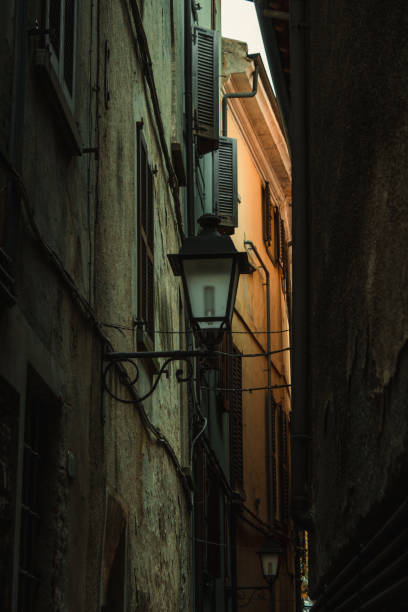 istock old lantern in the little street 2177232883