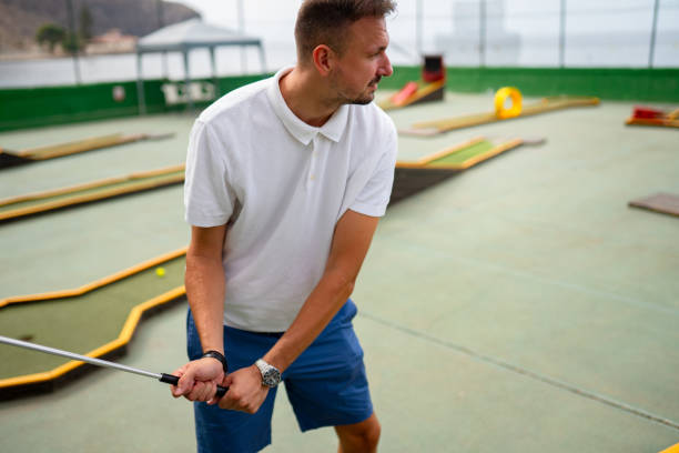 istock Enjoying one nice afternoon on a mini golf court 2177234538