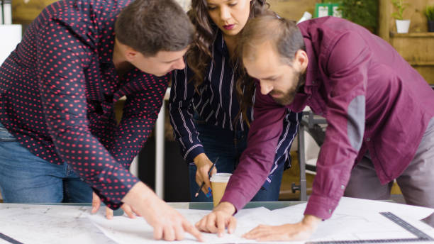 istock Creative agency meeting where team of architects and designers are talking 2177234607