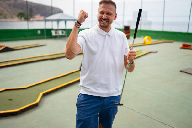 istock Enjoying one nice afternoon on a mini golf court 2177235403