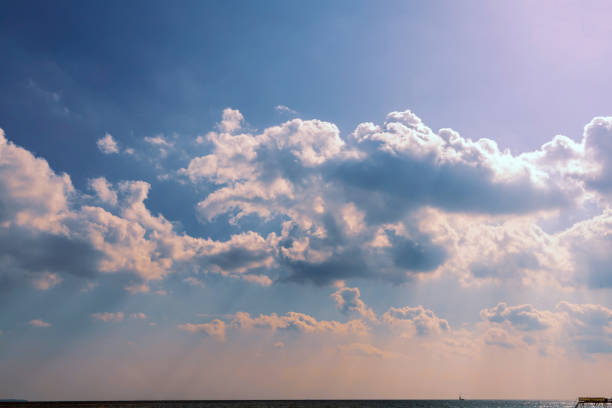 Beautiful white clouds on blue sky over sea