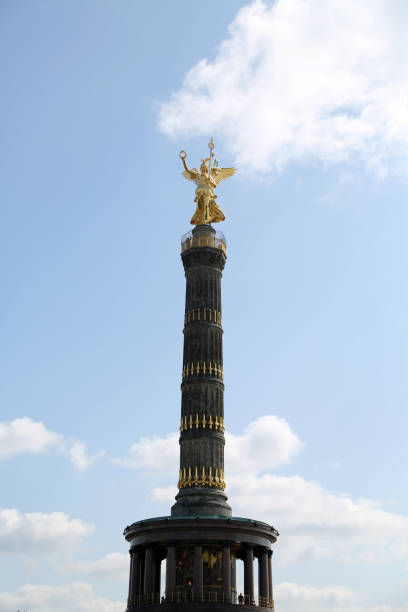 istock Majestic Berlin Victory Column stands tall against the blue sky, symbolizing triumph and resilience with its golden angel atop 2177246265