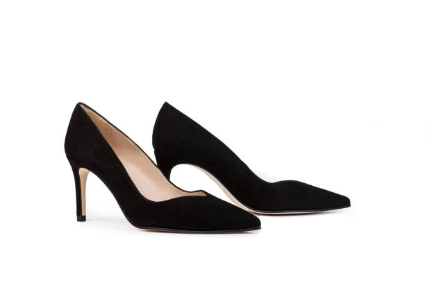 istock A pair of black high heel shoes on a white background with copy space 2177248692