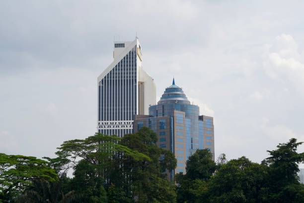 istock Landscape with cloudy sky, buildings and trees 2177257338