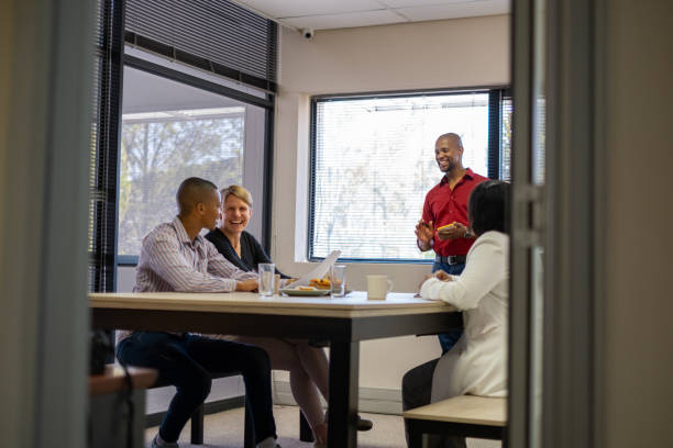 istock Colleagues meet in the company boardroom 2177264110