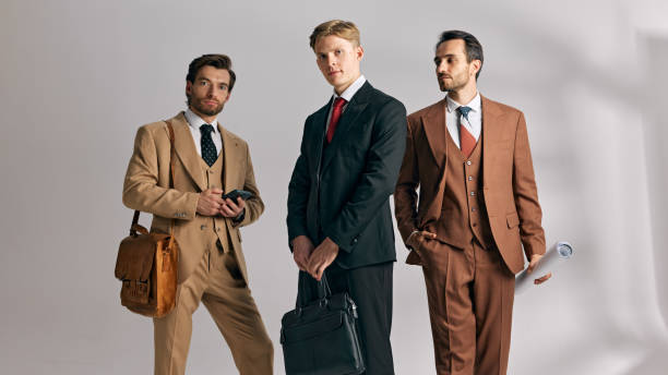 istock Holding documents and briefcases, young successful men prepared for important decisions and professional engagements against white background. 2177264247