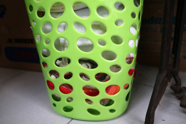 Dirty laundry hamper isolated on white.