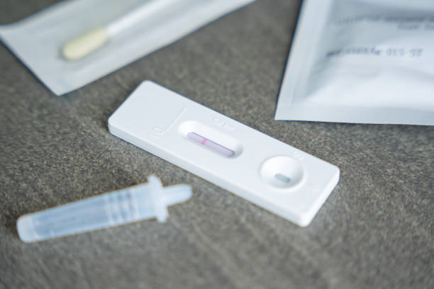 istock Rapid Antigen Test kit with with negative result during swab COVID-19 testing. Coronavirus Self nasal or Home test, Autumn exacerbation of viruses 2177272977