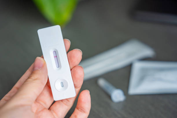 istock Rapid Antigen Test kit with with negative result during swab COVID-19 testing. Coronavirus Self nasal or Home test, Autumn exacerbation of viruses 2177272978