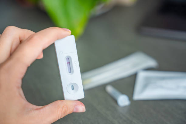istock Rapid Antigen Test kit with with negative result during swab COVID-19 testing. Coronavirus Self nasal or Home test, Autumn exacerbation of viruses 2177272982