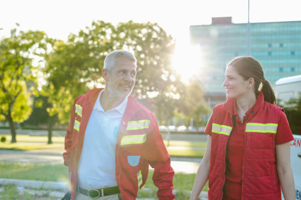 istock Cheerful paramedics walking outdoors on a sunny day 2177275262