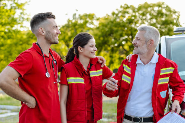 istock Emergency response team standing beside their ambulance vehicle 2177275509