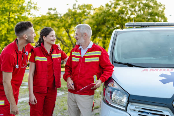 istock Emergency response team standing beside their ambulance vehicle 2177275511