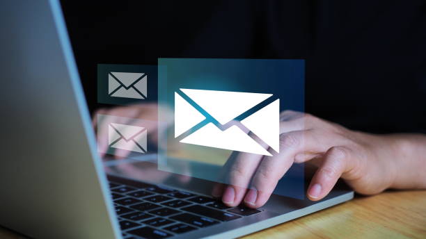 istock Businessman hands using Laptop typing on keyboard and surfing the internet on office table with email icon, email marketing concept, send e-mail or news letter, online working internet network. 2177277965