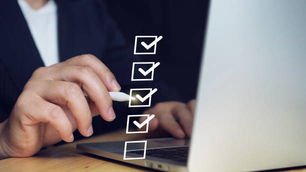 istock Business performance checklist, businessman using laptop doing online checklist survey, filling out digital form checklist, take an assessment, questionnaire, evaluation, online survey, online exam. 2177278011