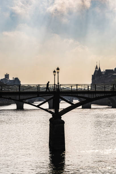 A black and white Silhouette of the bridge and the Eiffel Tower in Paris.