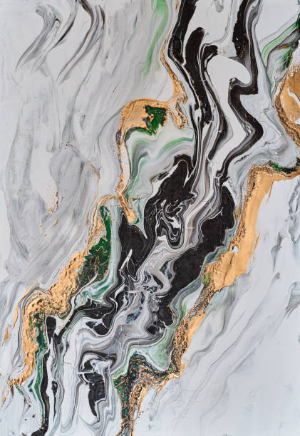 istock Abstract design with  white hues, accented by shimmering gold lines. The fluid shapes  natural mineral patterns,  a harmonious and elegant visual flow 2177278508
