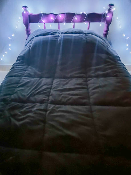 istock Kids room bed decorated with christmas artificial light 2177279457