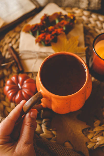 istock Maple leaf in hand, autumn cozy atmosphere 2177280982