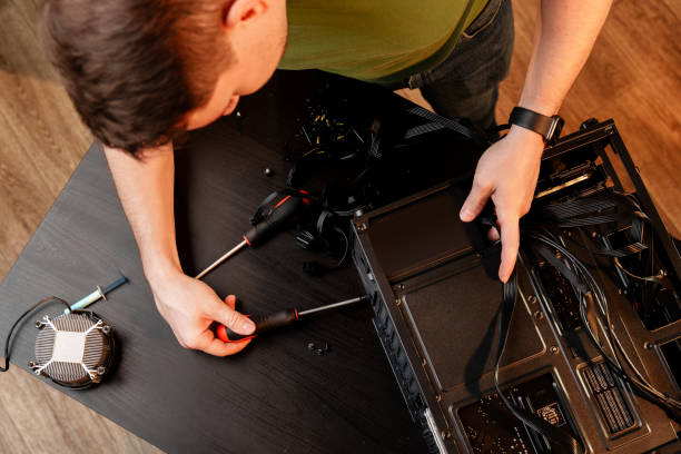 istock Close up of man repairing computer system unit 2177281103