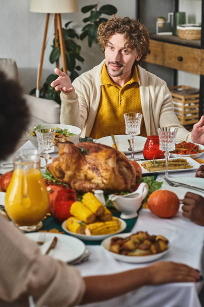 istock Friends and family unite for a multicultural Thanksgiving feast 2177281480